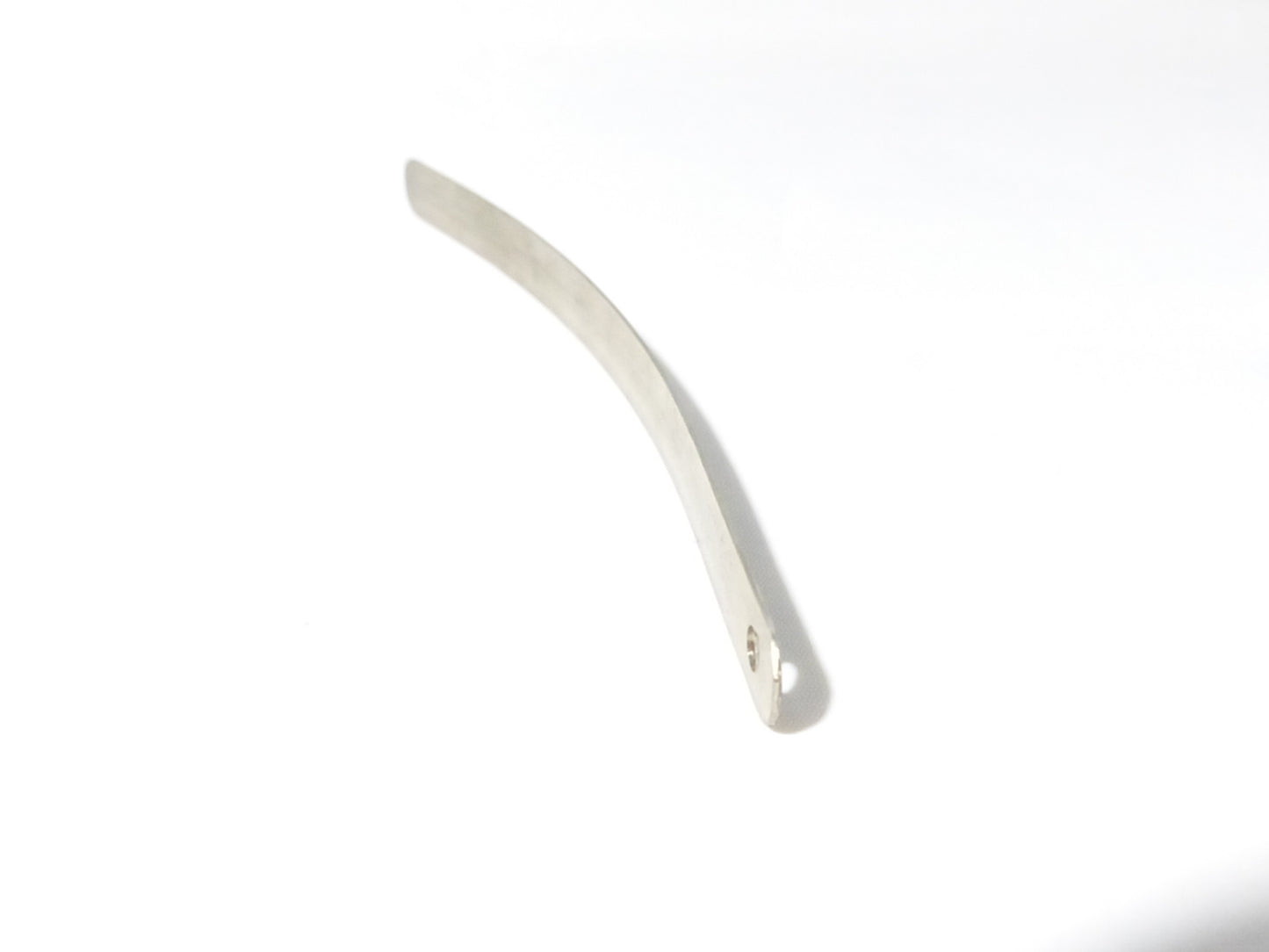 Fuxus leaf spring replacement part for hydraulic ram pump, showing the metal spring component used in the pump's mechanism.