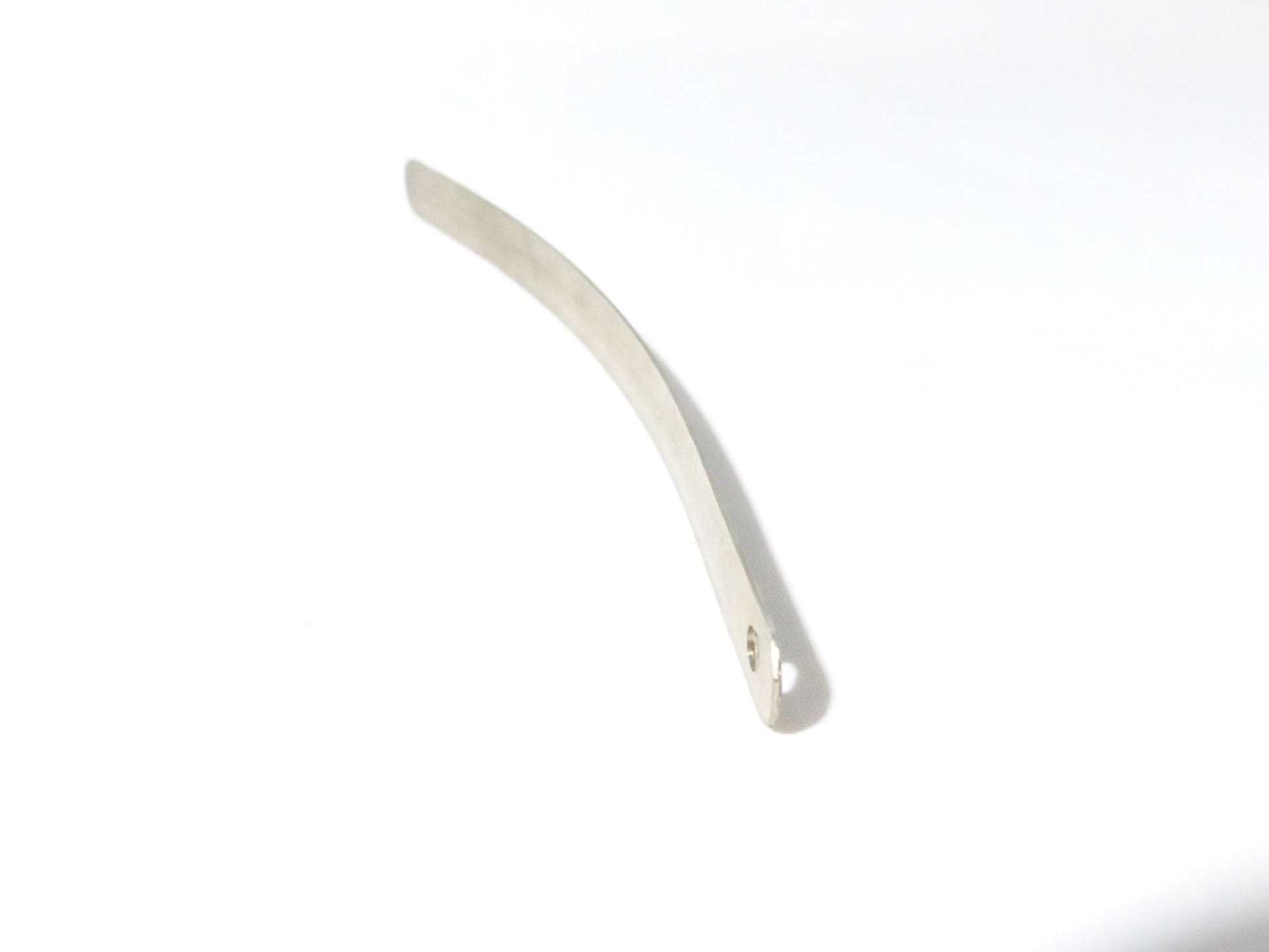 Fuxus leaf spring replacement part for hydraulic ram pump, showing the metal spring component used in the pump's mechanism.